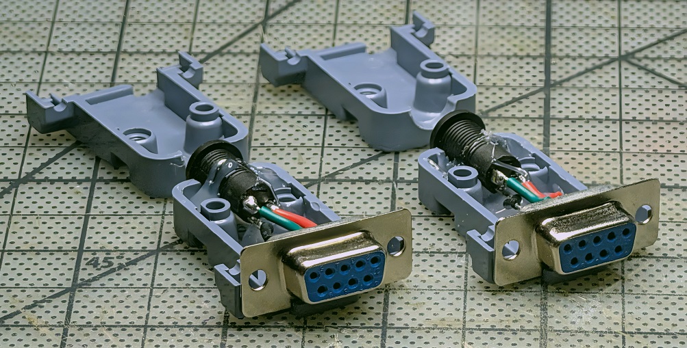 Wired DB9 and 3.5mm jack housings before final assembly