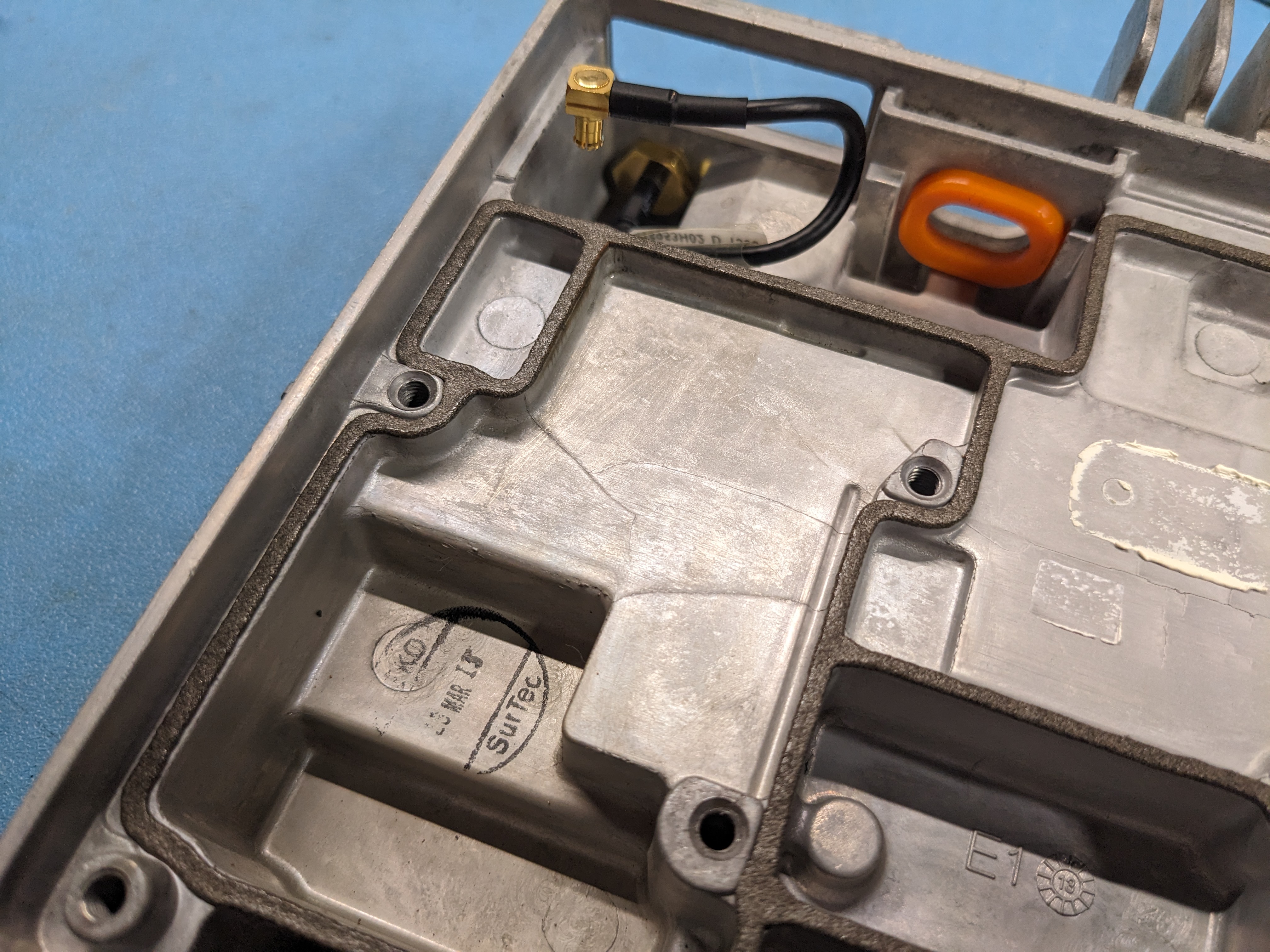 Cleaned area of damage to enclosure