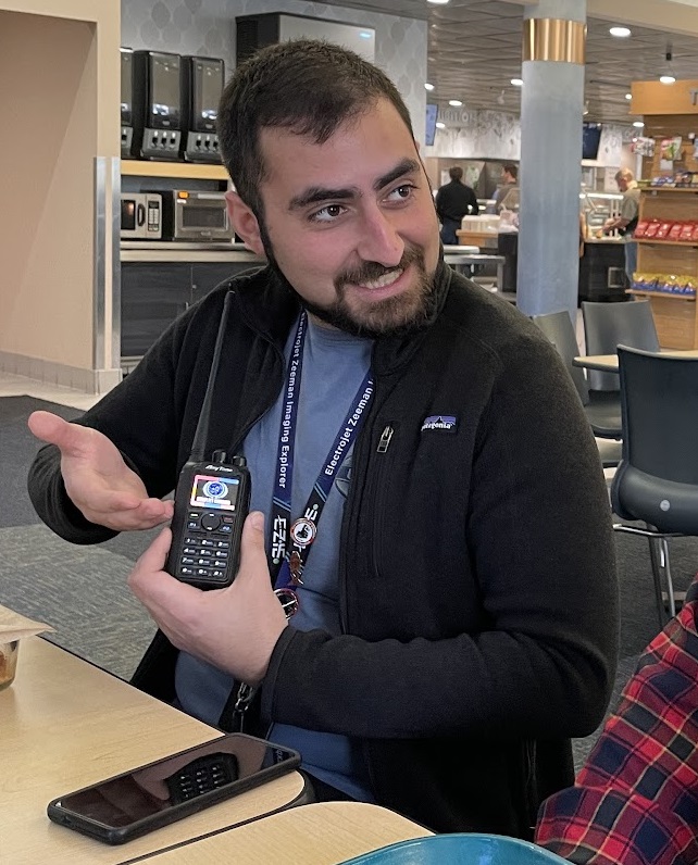 A photo of me showing a colleague my radio with LCARS graphics