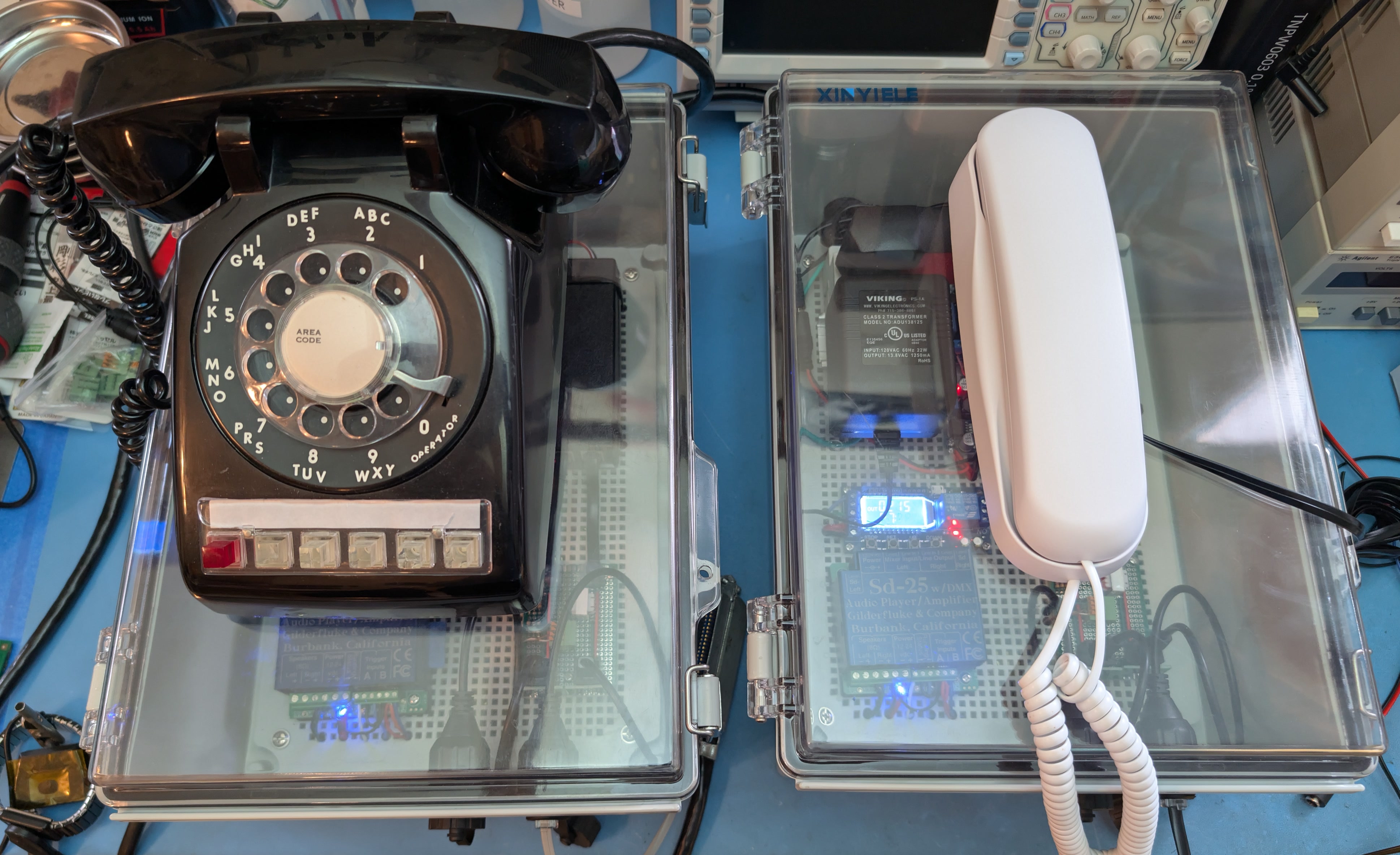 two_enclosures_two_phones