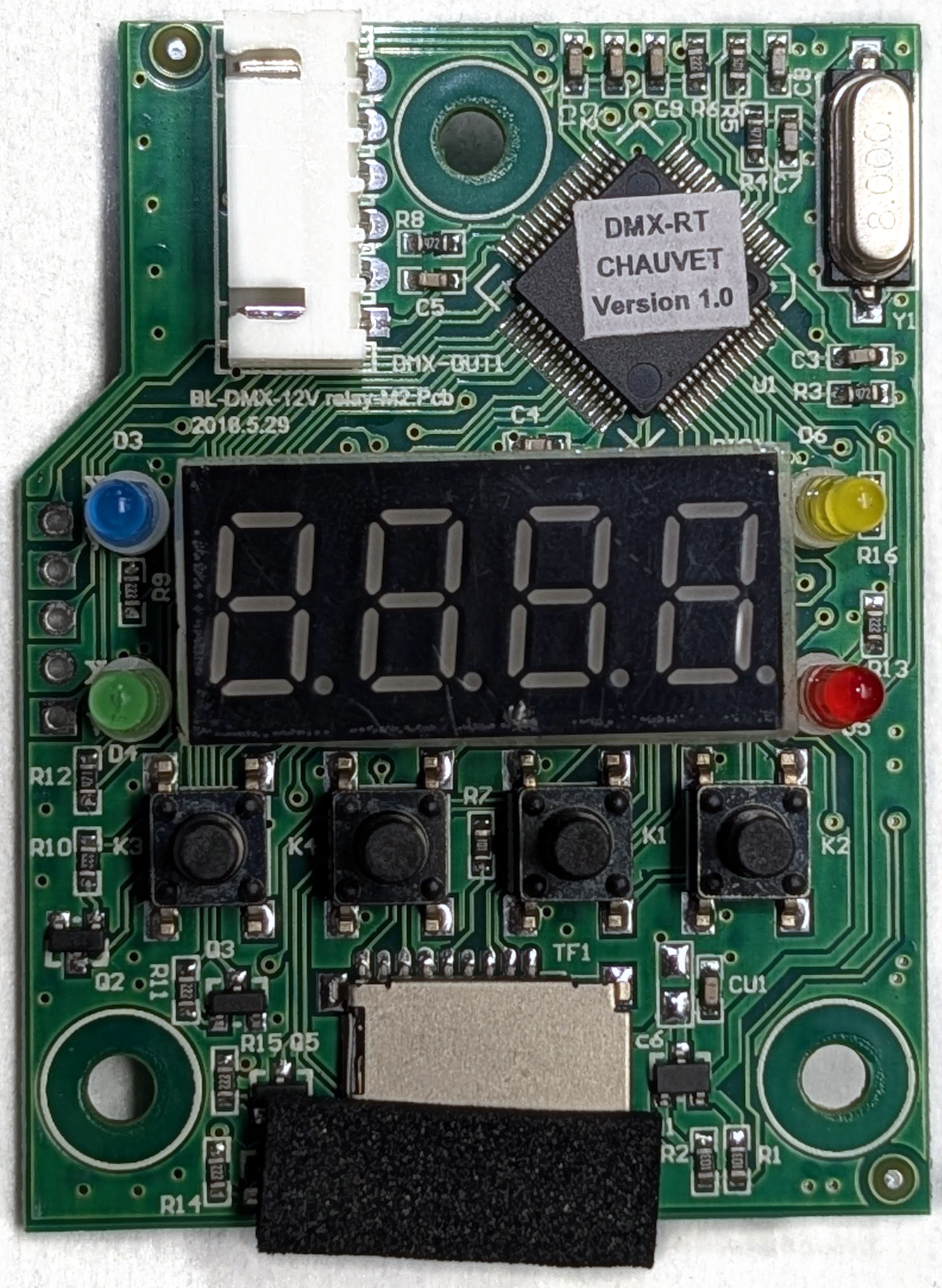 Chauvet DMX-RT control board top view showing the GD32F103RCT6 microcontroller under a Chauvet version 1.0 sticker, 8 MHz crystal, four-digit display, buttons, LEDs, and micro SD socket
