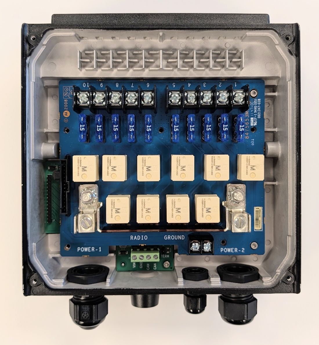 Open Relay Controller Rev A PCB (green) installed in the PMUN1046A enclosure alongside the OEM Motorola relay board
