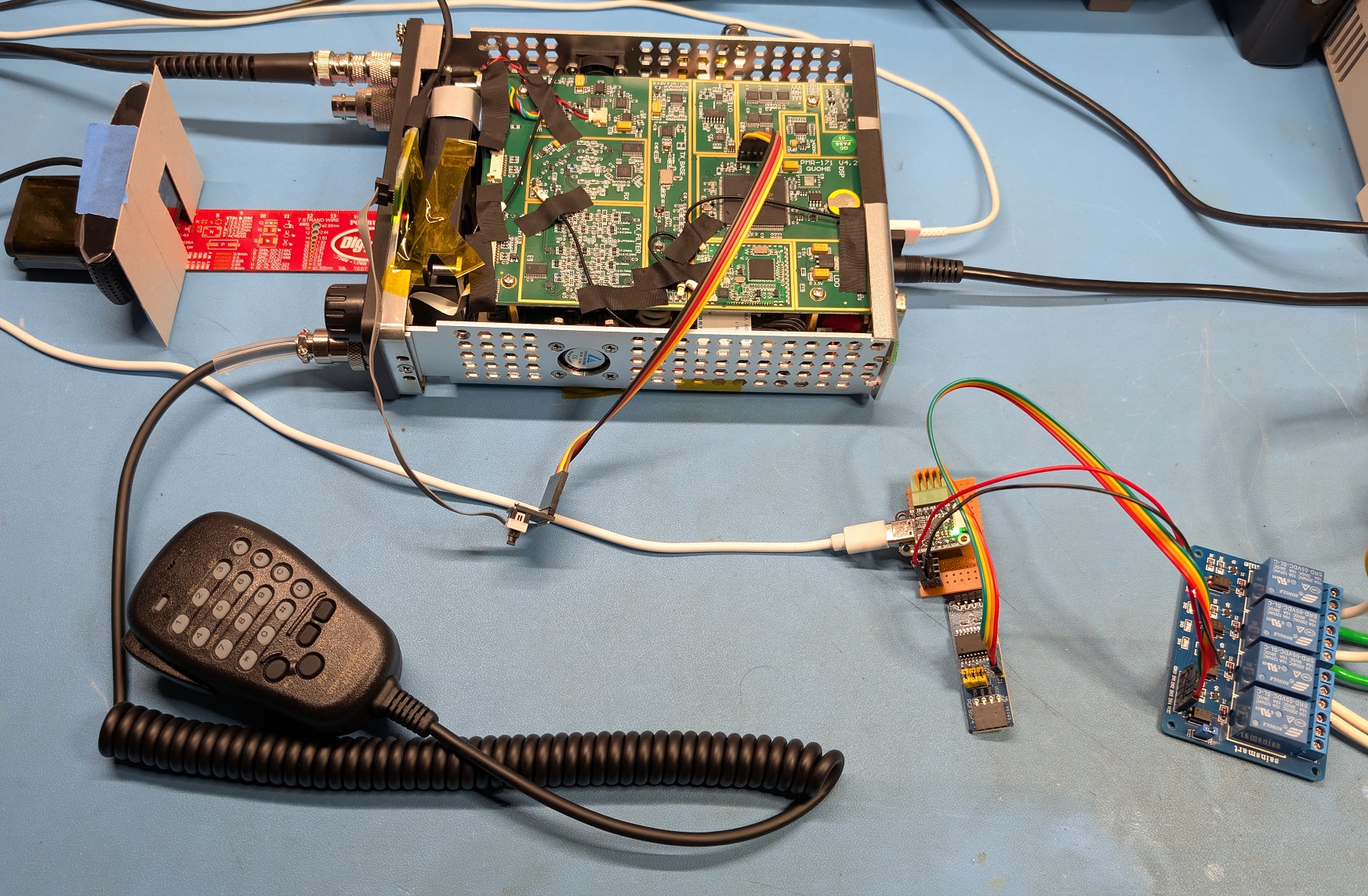 Testbed top view showing the PMR-171, J-Link, and camera