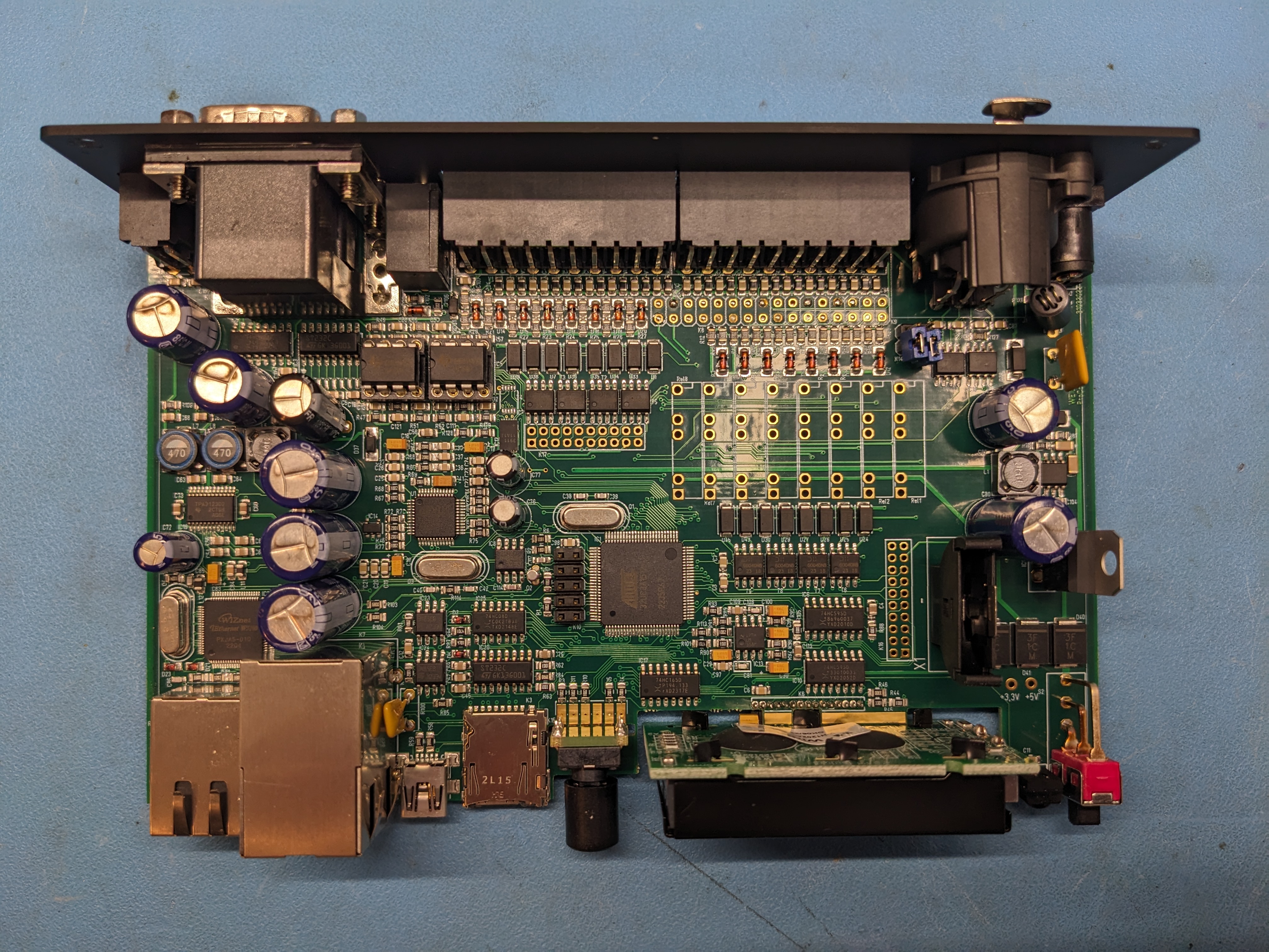 Weigl ProCommander4 main PCB top view showing AT32UC3A1512 AVR32 MCU, WIZnet W5100 Ethernet, VLSI VS1053b audio codec, TPA3123D2 class D amplifier, DS3911 DAC, and supporting ICs